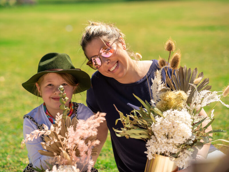 mother and daughter dried flower arranging
